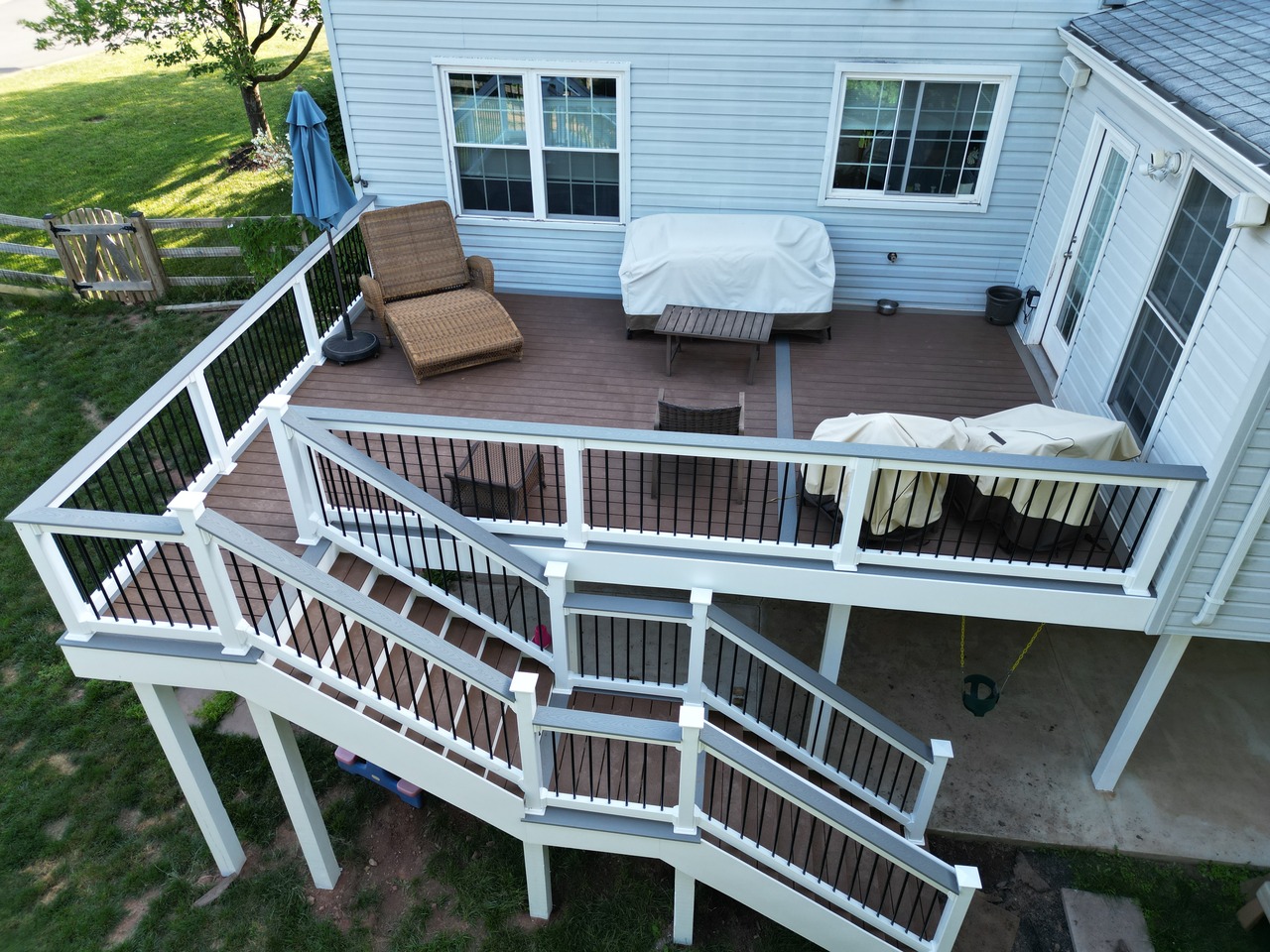 Composite Deck Extension with Lighted Staircase